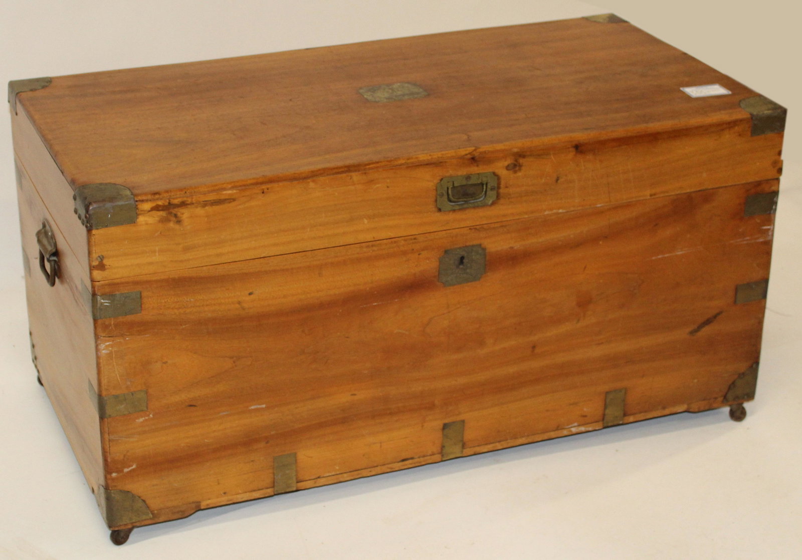 19th c Camphorwood blanket box: 19th c Camphorwood campaign style blanket box with brass binding and handles. 20 x 20 x 40"