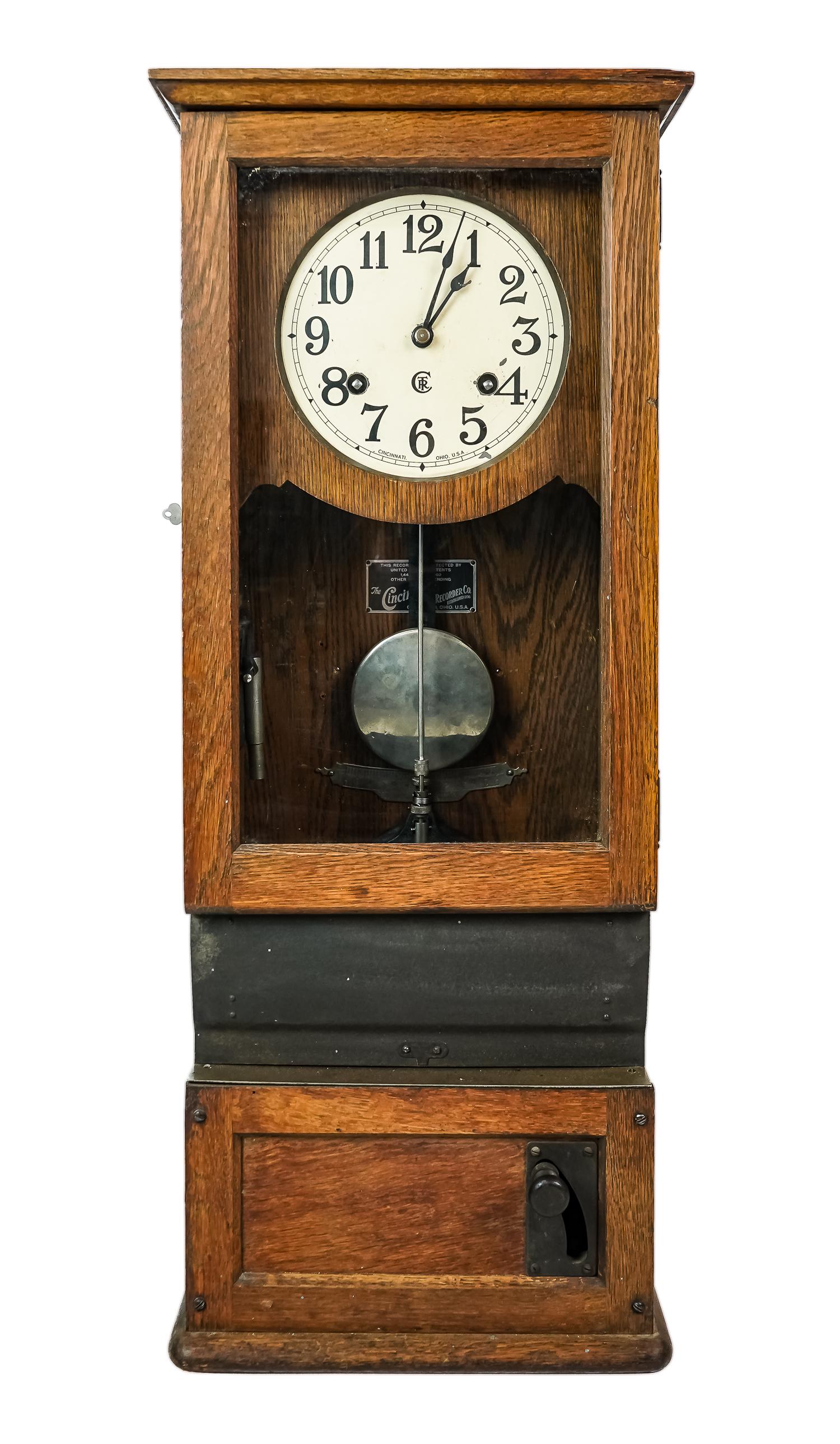Cincinatti Time Recorder Co.Time Clock: Cincinatti Time Recorder Company oak cased time clock, ht 35", top width 14 1/4"