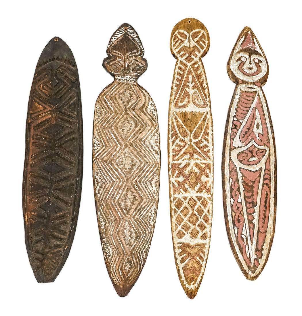 Four Papua New Guinea Spirit Boards: Lot of four ancestor spirit boards from Papua New Guinea. 23", 20.75", 21.5", 23.5"