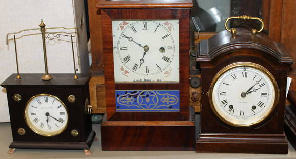 Sessions Tambour Clock, Cottage, Bracket Clocks, Horolovar: A group of four clocks including fine Sessions mahogany tambour mantel clock with porcelain dial, a fine Seth Thomas mahogany bracket clock with handle, a mid 19th c. New Haven cottage clock in mahoga