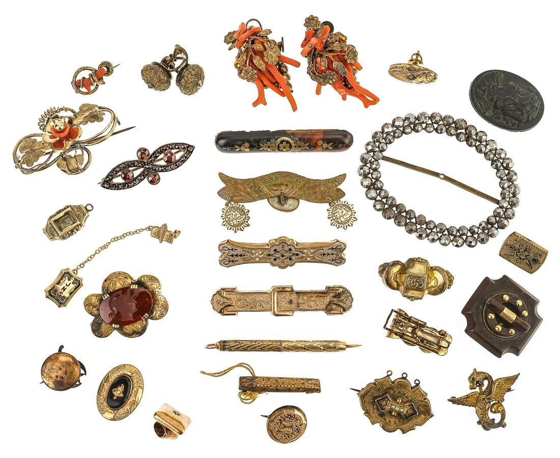 Fine Group of Victorian Jewelry: A fine group of Victorian jewelry including a pair of red coral & rolled gold ornate grape & vine motif earrings, Aesthetic Movement brooches, and earrings. Black lava cameo. Rectangular rolled gold w