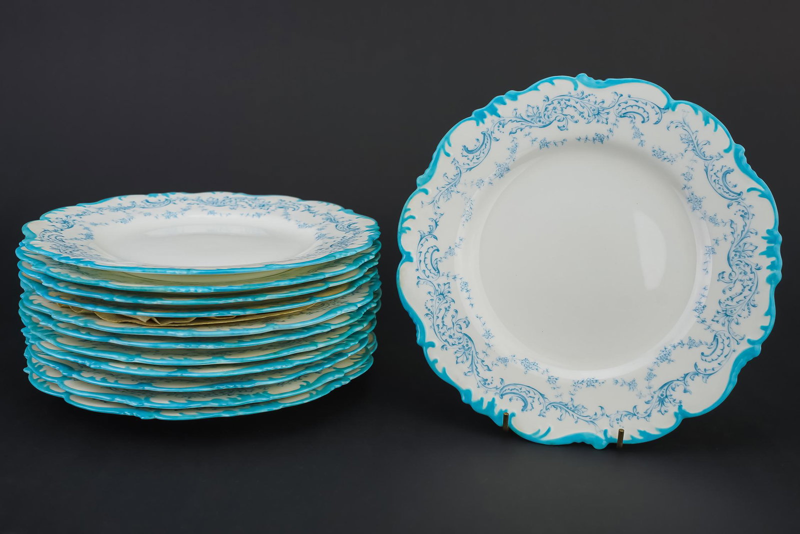 12 Cauldon Turquoise Rim Luncheon Plates: Set of 12 Cauldon fine English bone china smaller dinner or luncheon plates with rococo motif turquoise/celestial blue shaped borders 9" dia.