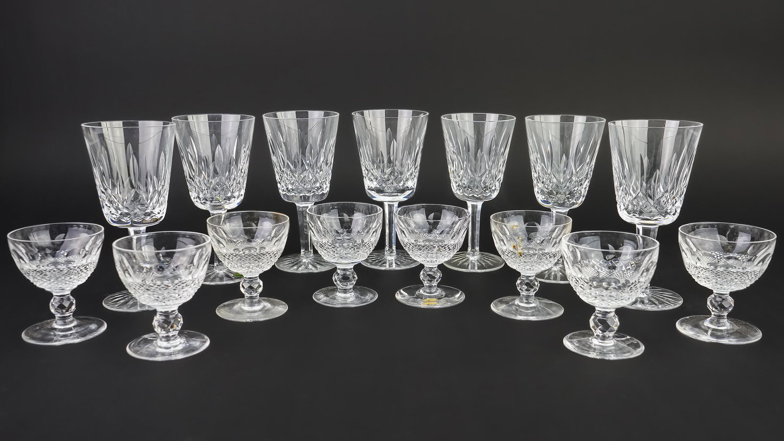 15 pcs. Waterford Lismore and Colleen Stemware: Group of 15 pcs of Waterford Irish crystal stemware including 7 Lismore tall red wine goblets, some with original labels, accompanied by 8 Colleen 3.5"-7"