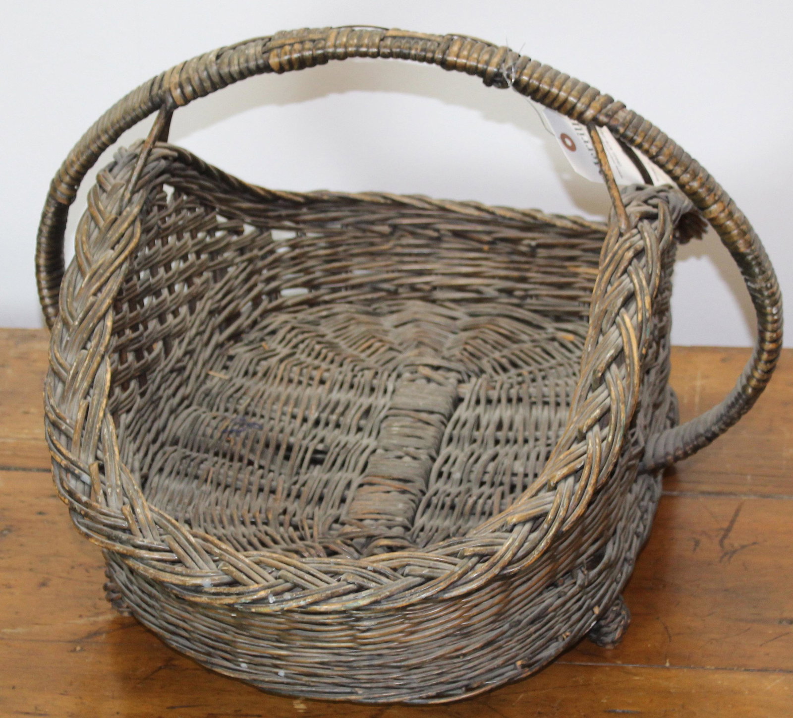 Bar Harbor Willow Wicker Log Carrier: Early 20th c. Bar Harbor style basket-weave willow reed wicker log carrier in old green paint on 4 ball feet 16" x 26" x 20"