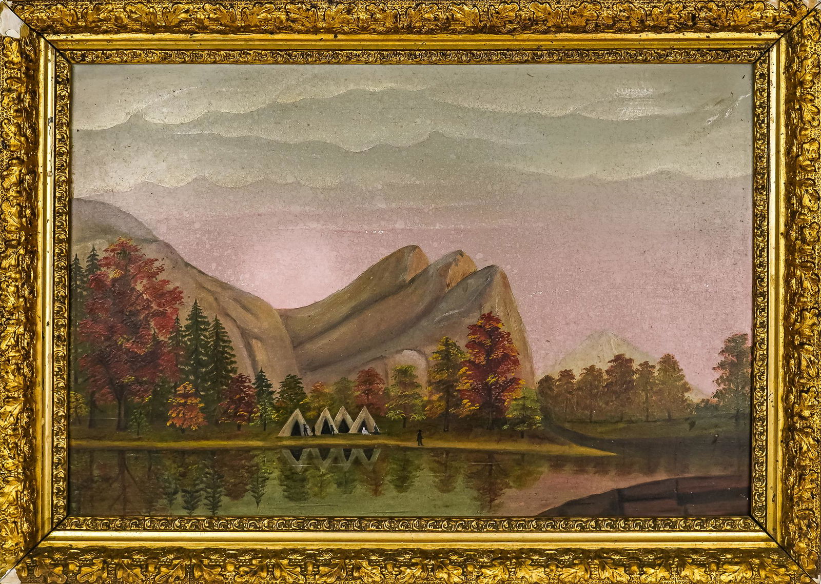 Hudson River School Landscape with Encampment: 19th c. primitive oil on academy board Hudson River School landscape of Native American encampment on lakeshore, naievely eulating the style of Ralph Albert Blakelock, in period gilt gesso frame 12" x