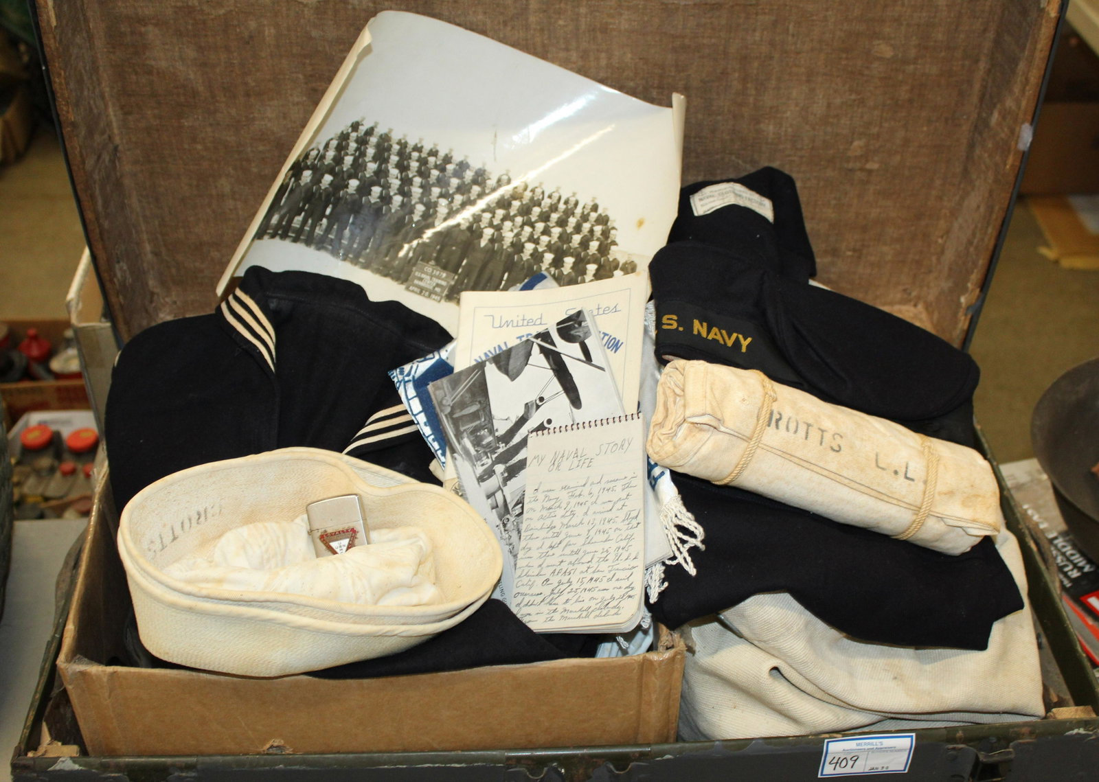WWII Navy Sailor Archive: WWII era US Navy Sailor archive- for Lester Lee Crotts, included handwritten War Story narrative, uniform, photograph, Training Center ephemera, footlocker, etc