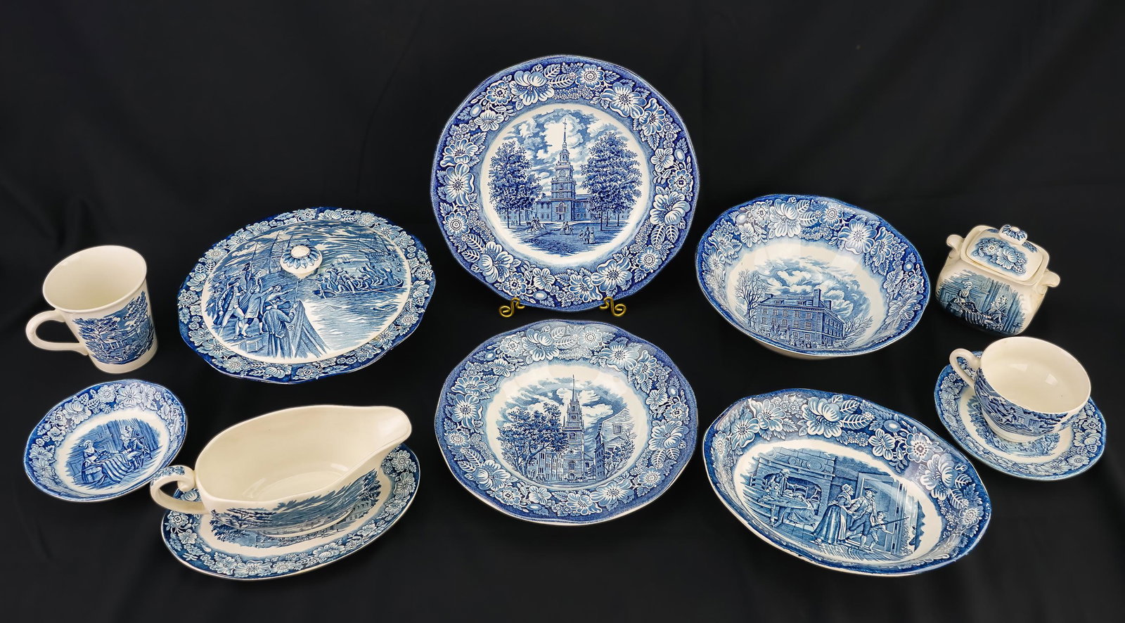43 pcs. Liberty Blue Staffordshire Dinnerware: 43 pcs. Liberty Blue Staffordshire transfer decorated porcelain dinnerware including teapot, covered serving dish, gravy boat and undertray, 9 dinnerplates, serving items, etc.