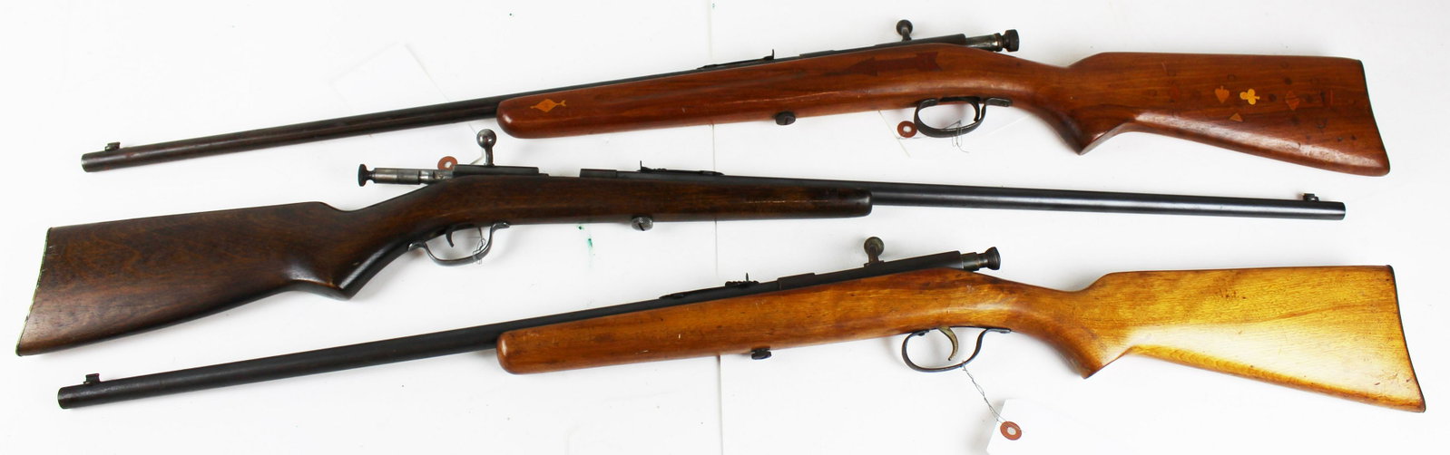 Three .22 target rifles: Three .22 Caliber rifles- Savage Model 3 with inlaid stock featuring arrows, card pips etc, Springfield JR Rifle and Springfield Model 52 A Rifle - THIS FIREARM REQUIRES A 4473 BACKGROUND CHECK OR FFL