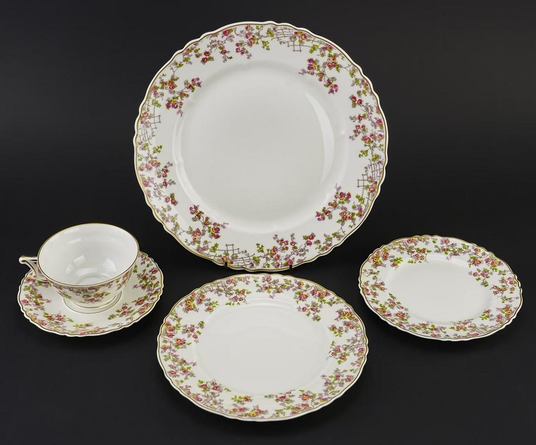41 pcs. Haviland Limoges Porcelain Dinnerware: 41 pcs. mid 20th c. Haviland Limoges porcelain dinnerware having rose and lattice trellis decoration including 8 cups and saucers, dinner plates, luncheon plates, side plates, oval serving bowl and pl