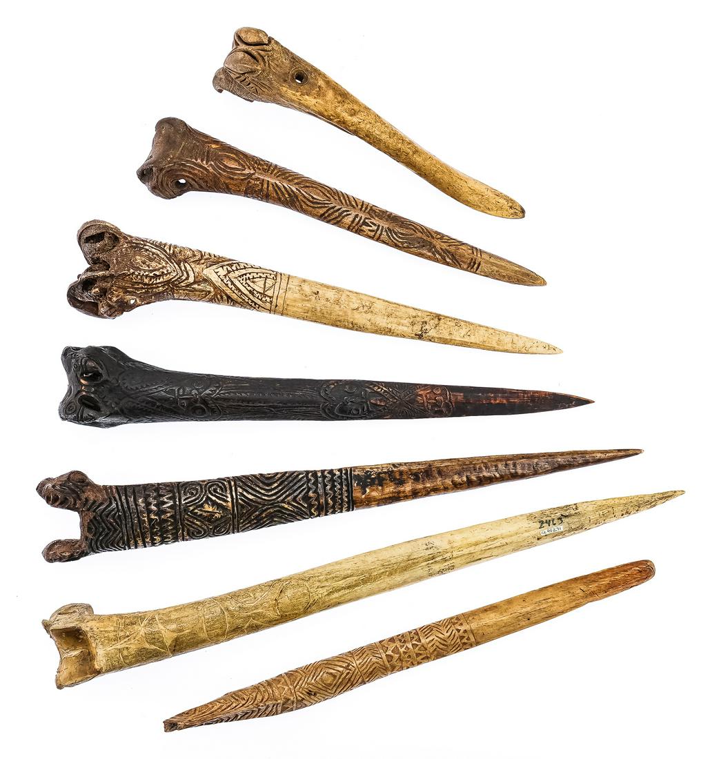 Seven Bone Daggers: Collection of seven cassowary bone daggers and tools from Papua New Guinea, with incised decorations. 7.5"-15"