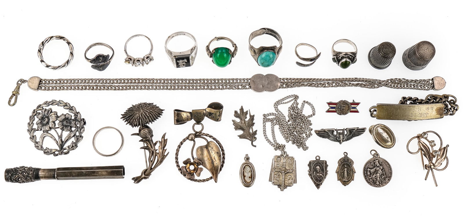 Sterling Silver Rings, Thimbles, and Jewelry: Group of sterling silver jewelry and assorted articles including rings, two Victorian thimbles, watch chain, brooches, religious medals, insignia, etc.