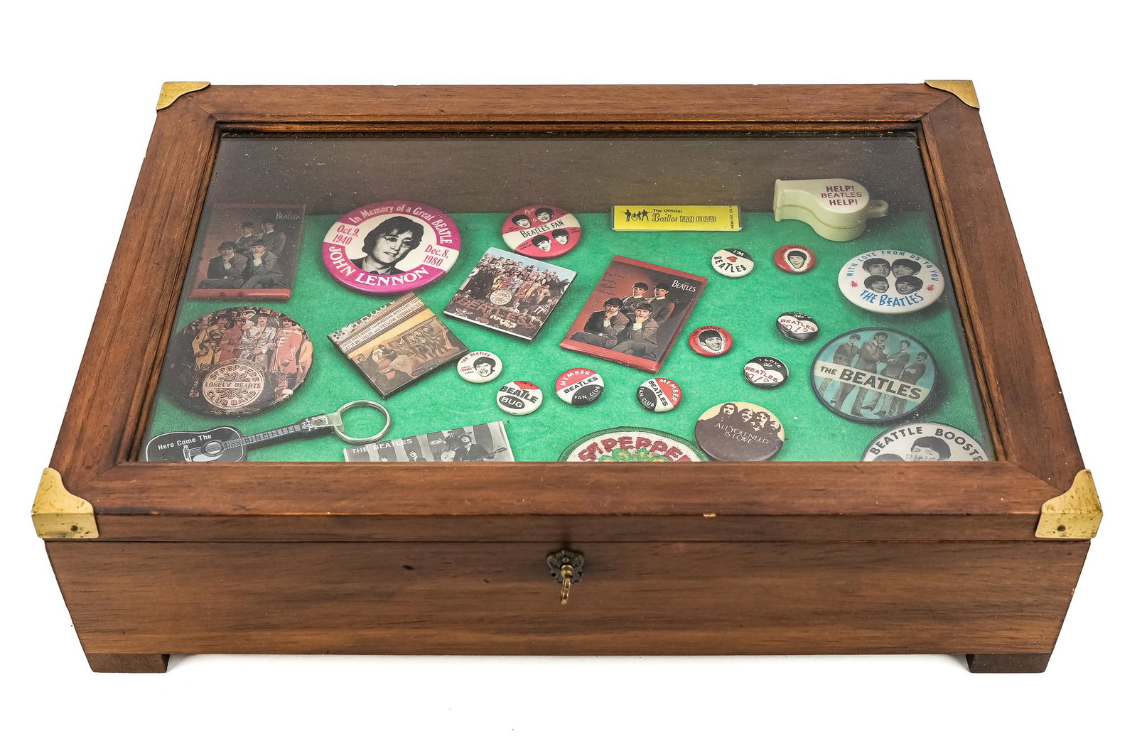 Vintage Beatles Pinbacks, Buttons, Mirrors: Vintage Beatles collectibles, including Flicker/ Flasher pinbacks, pinback buttons, pocket mirrors, whistle, chewing gum, etc., with display case, 17" x 12" x 4 1/4" (contents not attached, not glued 