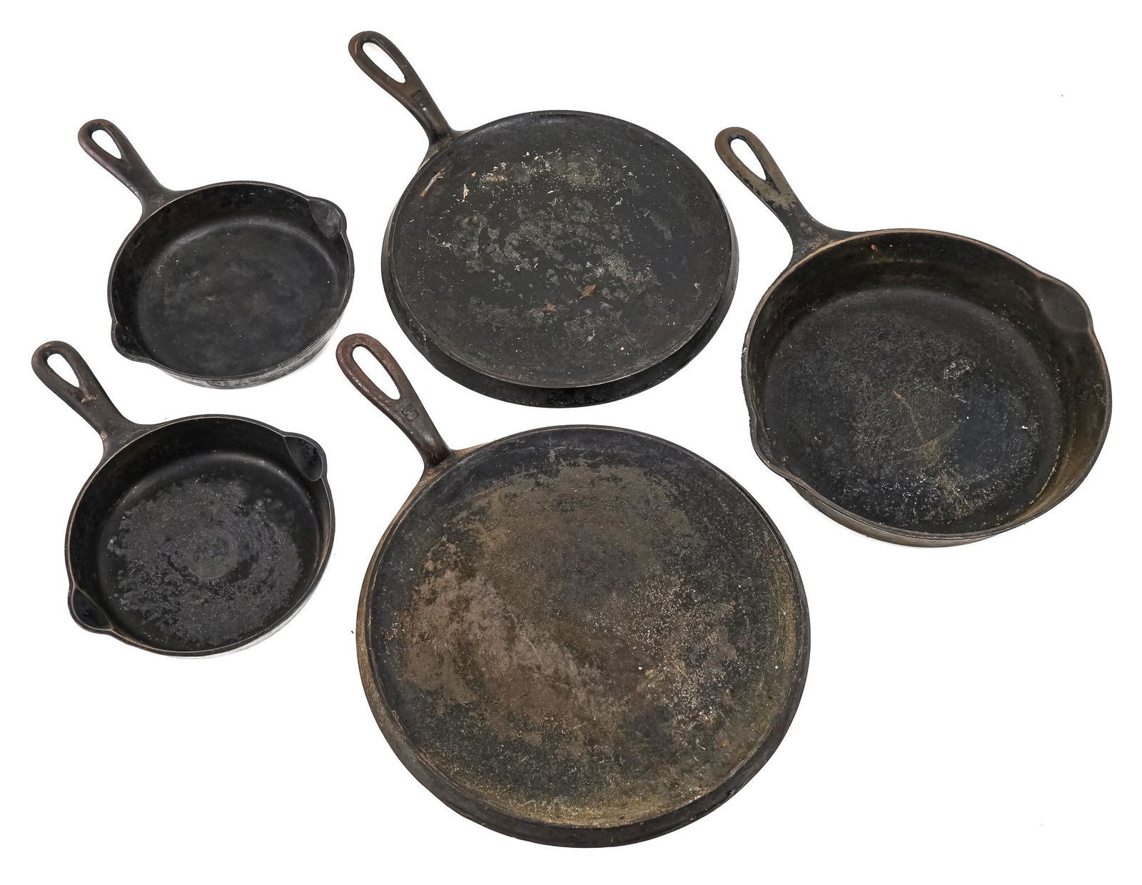 Five Pieces of Large Block Griswold: Griswold cast iron with large block marks. Two griddles, size #8 and #9. Two size #3 skillets and one #6 skillet. Some wear, rusting throughout.
