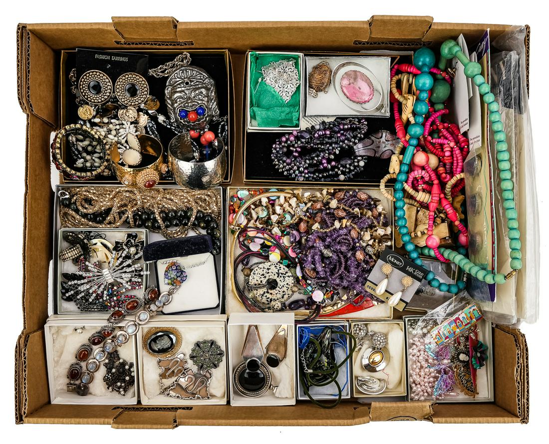 Lot of Sterling and Costume Jewelry: Lot of semi-vintage and contemporary costume jewelry, including some sterling silver bracelets and earrings, rhinestone pins, earrings, beaded necklaces, etc.