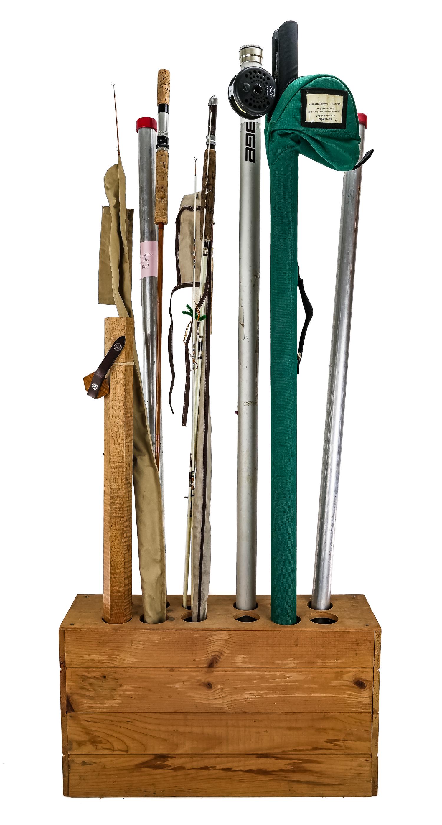 Rods & Rod Holder: A group of rods including a 2 pc restored bamboo fly rod, Redington Purist 8 1/2' 5WT, L L Bean Angler 2 pc fly rod, Shakespeare Wonder rod, tiger maple rod tube, other rods, and a 12 tube rod stand.