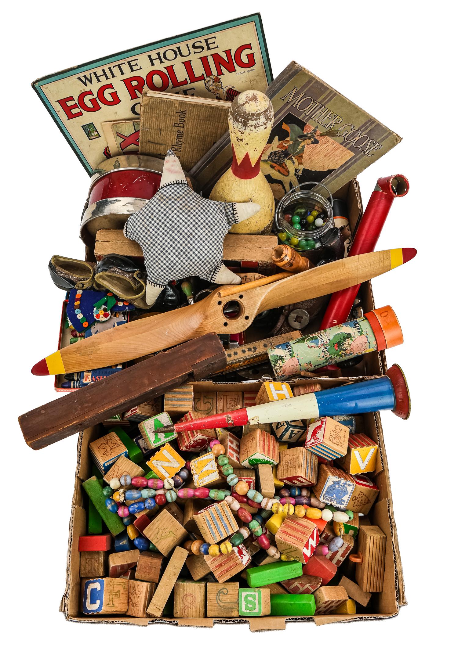 Group of Vintage Toys, Games, Marbles. etc.: Group of vintage children's playthings including marbles, games, small tin litho toys and Cracker Jack prizes, embossed wooden blocks, horns, bowling pin, small wooden airplane propeller, etc.