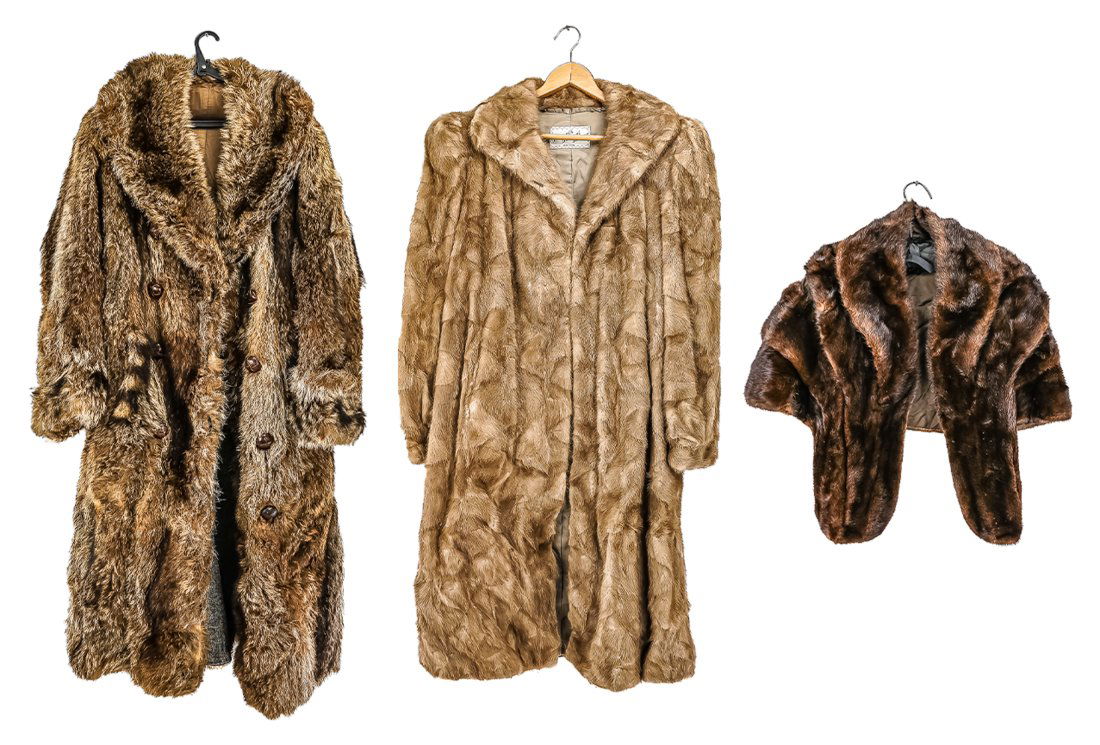 Three Vintage Fur Coats and Garments: Includes mink coat with matching hat, muff, collar, and mink muff in garment bag; pastel mink side coat from Vermont Personal Furriers w/ garment bag; mens flannel-lined raccoon coat with garment bag.