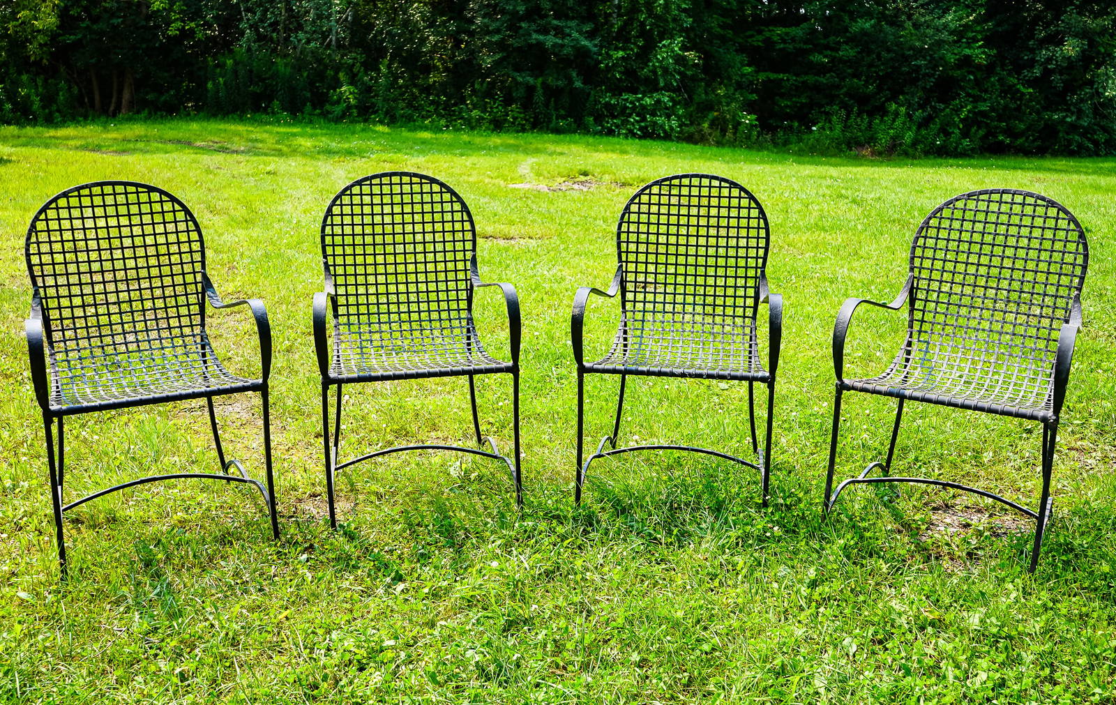 Set Of Four Winthur Design Iron Patio Chairs Auction