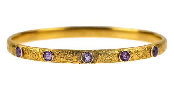 Victorian 14k & Amethyst Bangle Bracelet: Victorian 19th c 14k yellow gold engraved bangle bracelet with 5 .3 ct round cut bezel set amethysts. 2 1/2" diameter, 8.3 grams t.w. Good condition with period fitted leather oval box with satin and