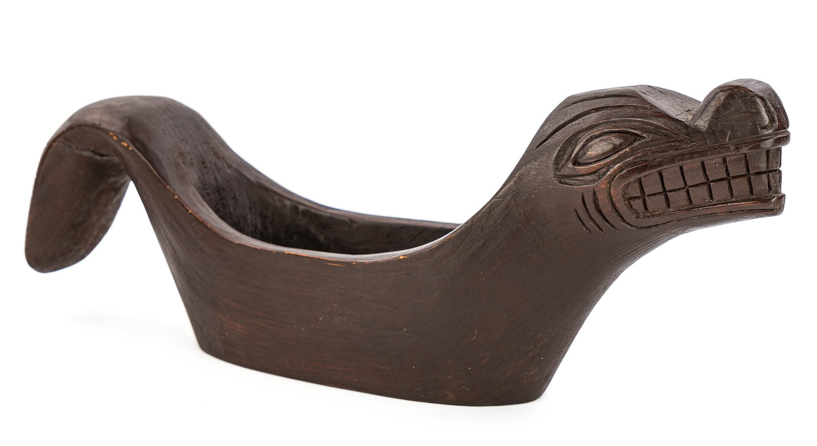 Late 20th c Tlingit Carved Grease Bowl: Late 20th c Tlingit carved pine wooden grease bowl, signed with monogram JF on bottom, old glue repair to tail, length 16 1/2"