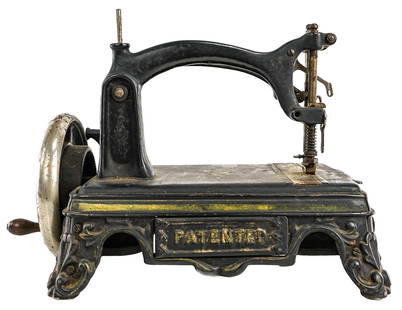 Cast Iron 19th c American Table Top Sewing Machine: Mid 19th c cast iron table top "American" sewing machine. Age appropriate wear. 13" long