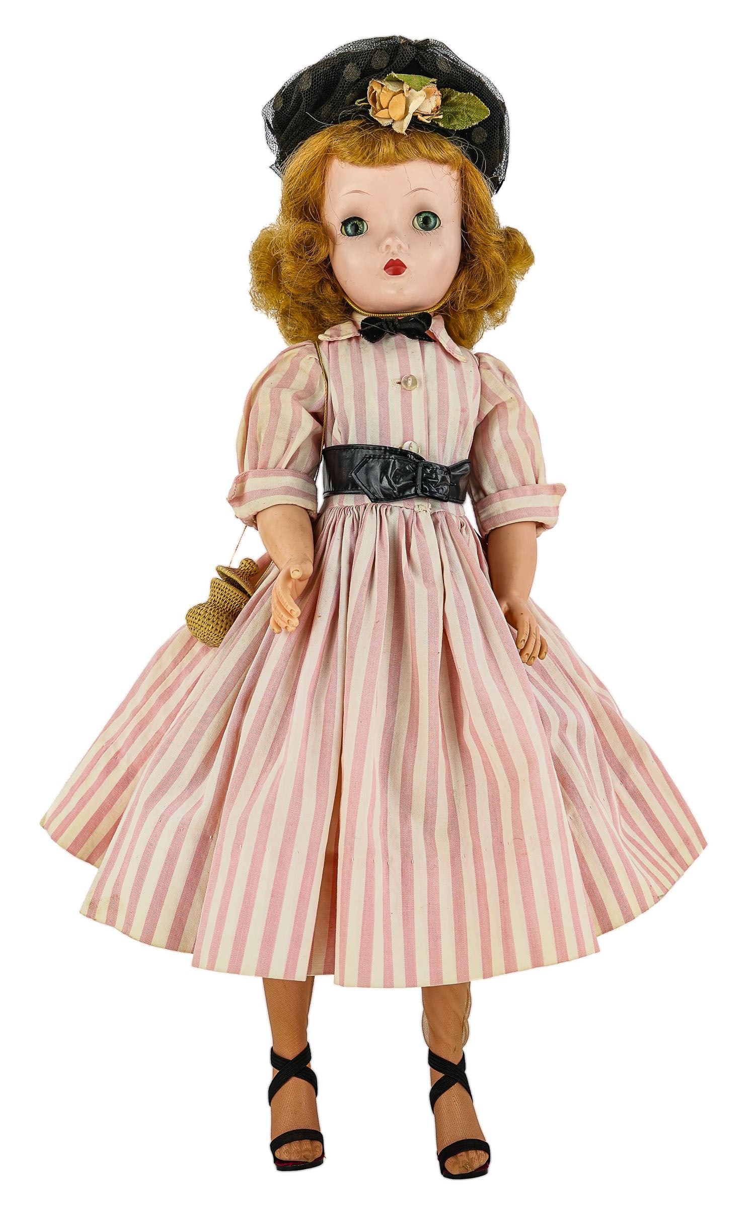 1950's Madame Alexander 20" Doll: 1950's Madame Alexander 20" doll, Cissy face, hard plastic, wearing original tagged dress, blue sleep eyes, applied upper lashes, 20" high