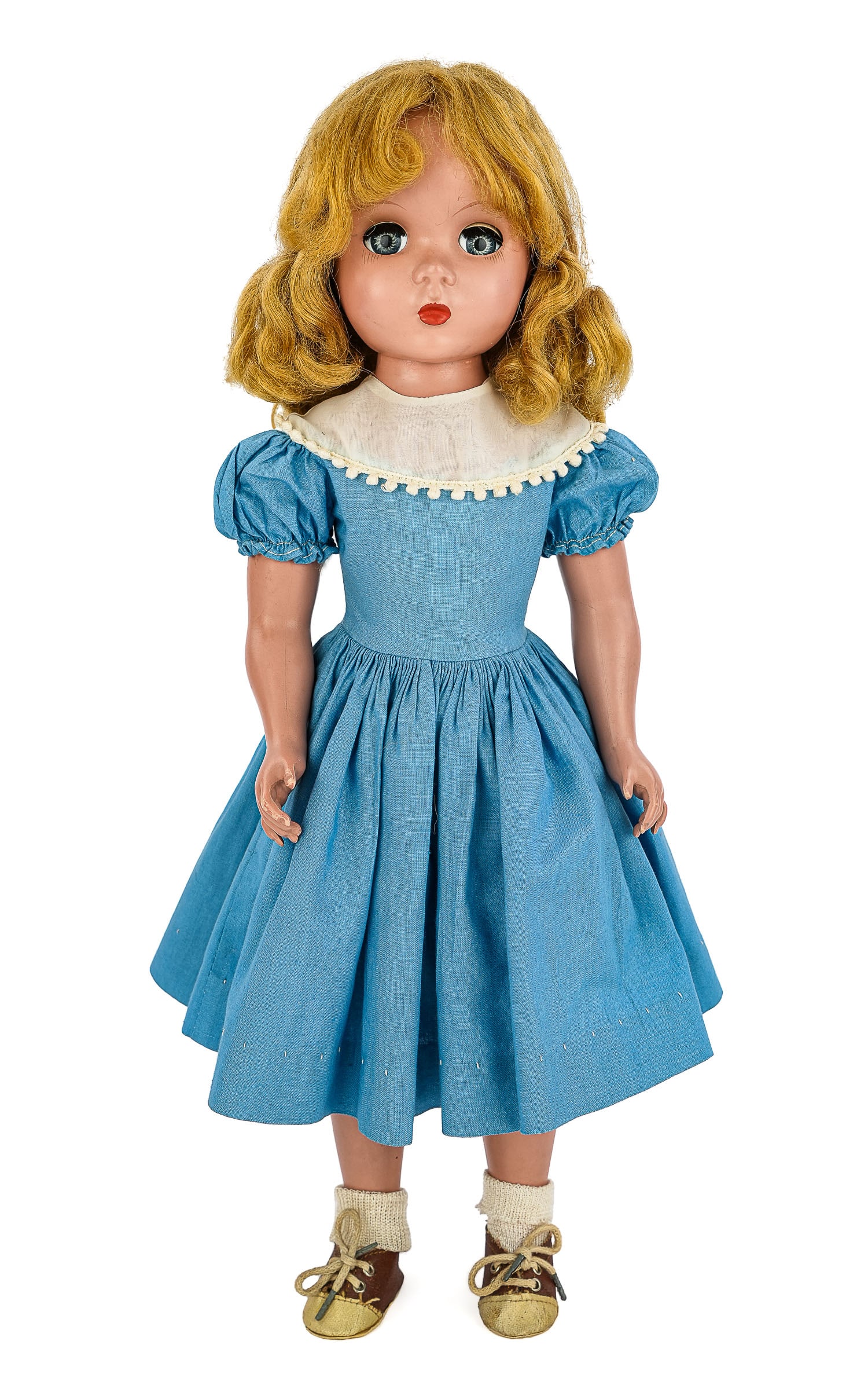 1950's Madame Alexander 17" Doll: 1950's Madame Alexander 17" Cinderella doll, hard plastic, wearing original tagged dress, blue sleep eyes, applied upper lashes, ht 17"