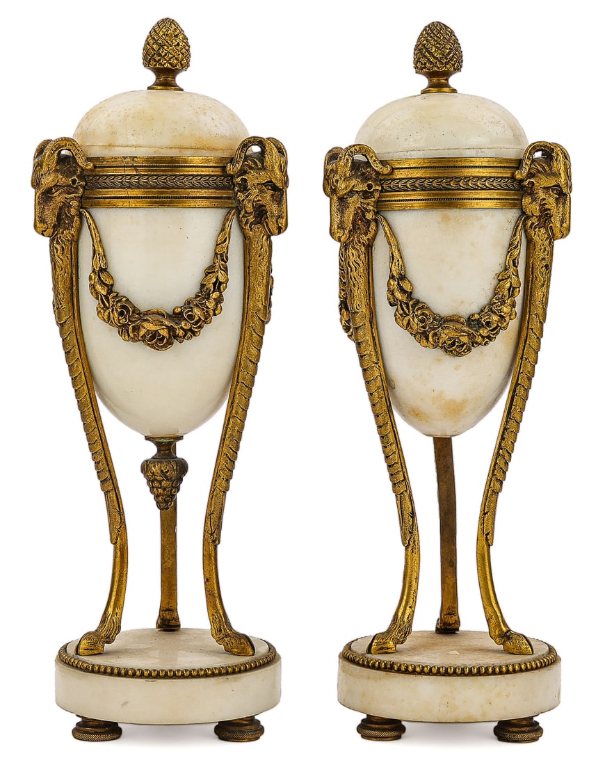 Pair of French Garniture Urns: Pair of French marble Garniture Urns / Candle sticks with Ormolu ram's head decoration and reversible tops, marked made in France on one foot (Probably 1920's construction) 11 x 3"diameter, one urn mi