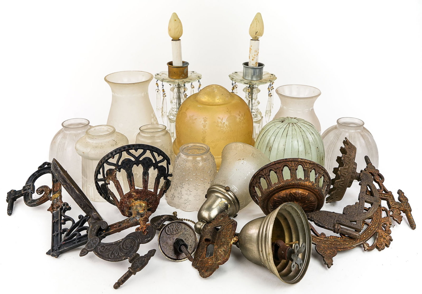 Early Lighting: A group of 19th & 20th c lighting including cast iron brackets, shades, and pair of Fostoria type electrified boudoir lamps.