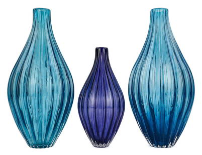 3 Kosta Boda Ann Wahlstrom Calebrass Vases: Group of 3 Kosta Boda Swedish art glass "Calebrass" vases designed by Ann Wahlstrom (1957-), including a pair in aqua and single in smoky blue, signed on bases 10.5"-`4.25"