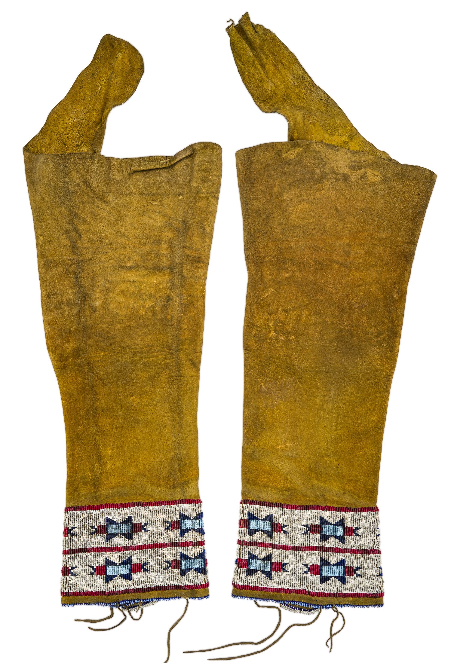 Early 20th c Blackfoot Dance Leggings: Early 20th c Blackfoot beaded dance leggings, possibly made from an earlier belt