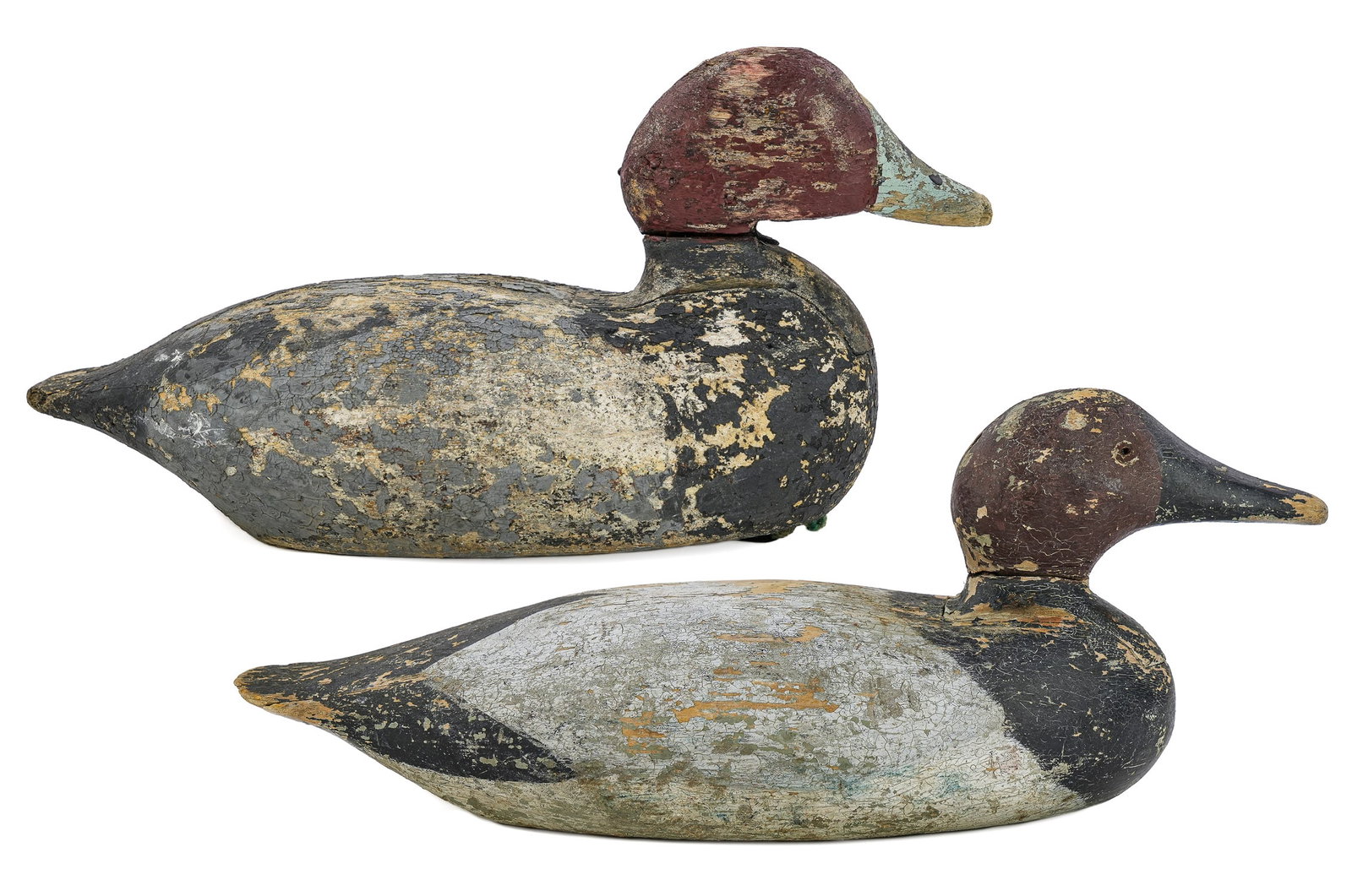 2 Maine Decoys: Late 19th c or early 20thc. Inset heads, Canvasback and a Redhead. Worn original paint. 15" and 13".