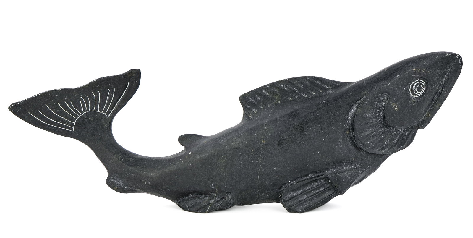 Inuit Blackstone Carving of a Fish: Inuit blackstone carving of a fish "innaluk", signed Gilbert Hay, Nian, Labrador, August, 1993, length 10 1/2"