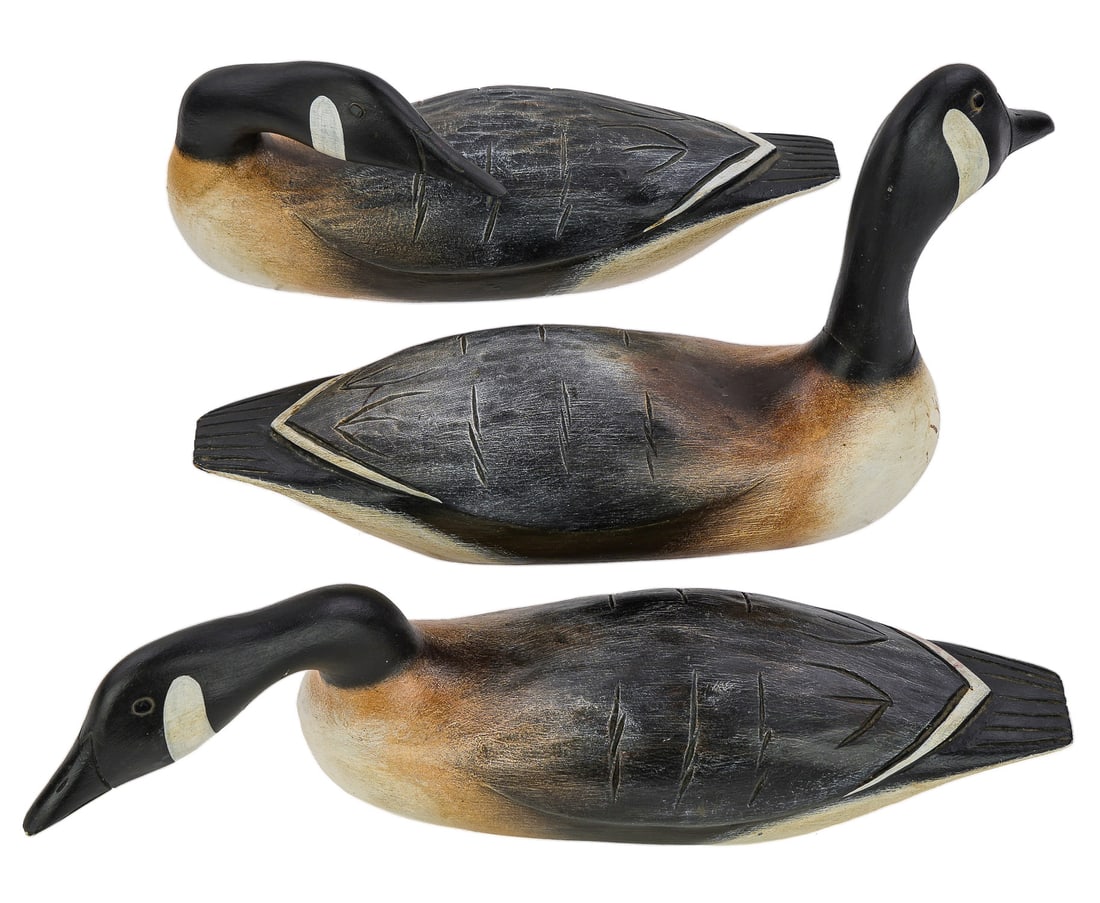 3 Miniature Hank Walker Goose Decoys: A group of 3 miniature Canadian Goose decoys signed by Hank Walker Newbury, Massachusetts, 1919-1995. 12 to 14" long. Each with different head sets. Good condition.