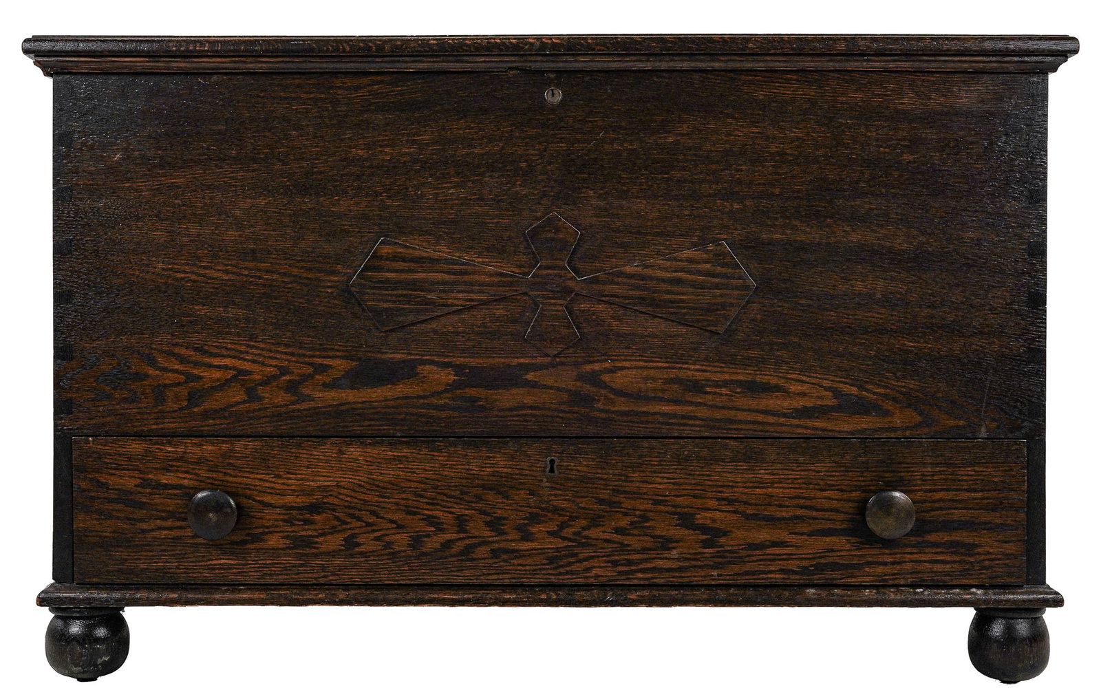 Early 20th C Oak Blanket box in dark finish: Early 20th c Oak Arts and Crafts blanket box, one lower drawer in dark finish with Applied Cruciform decoration, and ball feet 25 x 40 x 20"