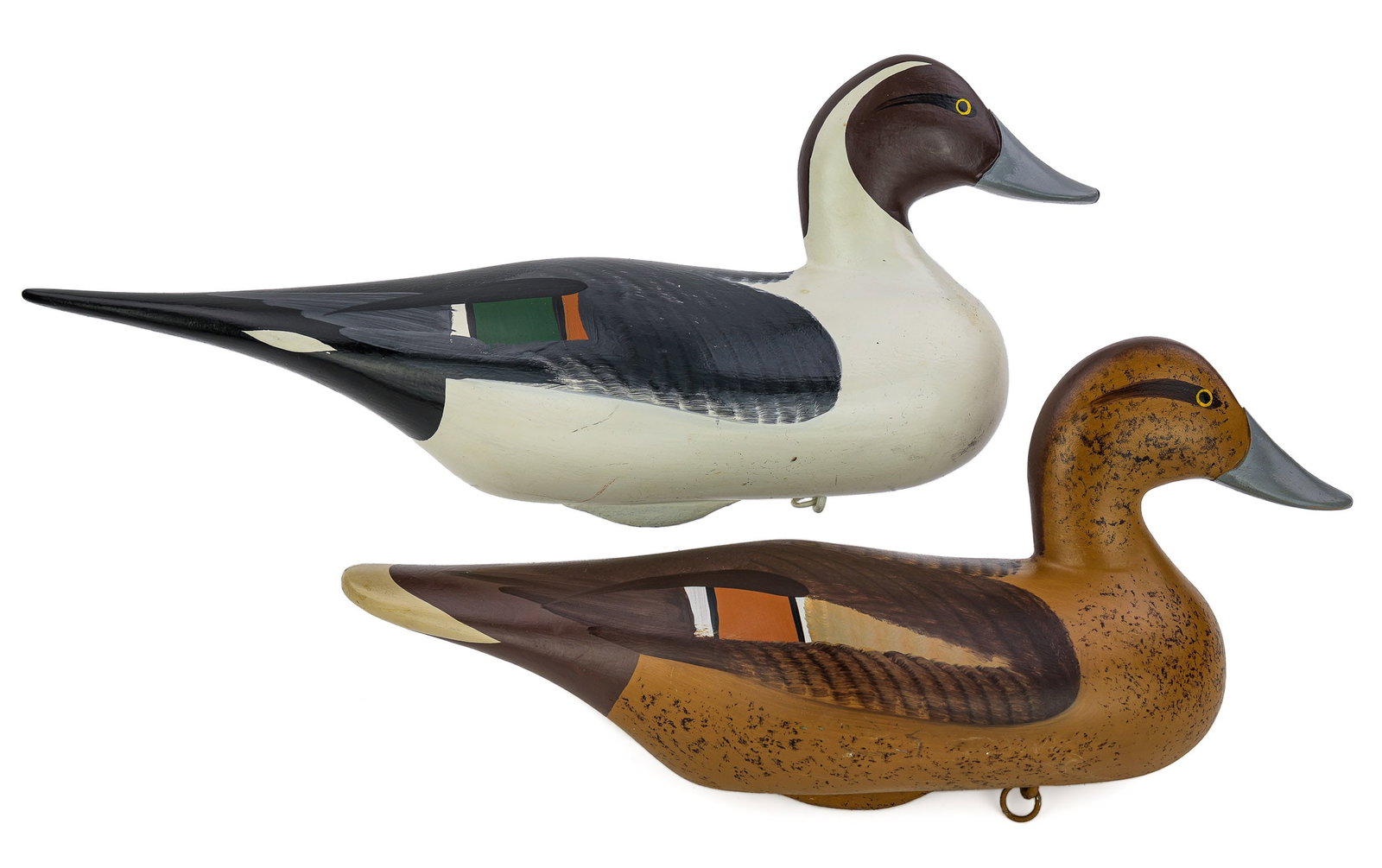 Pair Jobes Pintail Decoys: Havre de Grace Maryland pair of Pintail duck decoy signed Capt Bob Jobes. 19" long. Light wear. Overall very good condition.