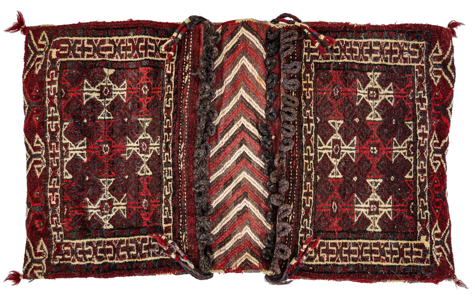 Central Asian "Oriental" Saddlebags: Pair of Central Asian/ Persian/ Oriental wool carpet saddle bags in a Tekke style with closing loops, and central ridge, each bag face measures, 14 x 21" overall 21 x 35" with one minor hole on back s