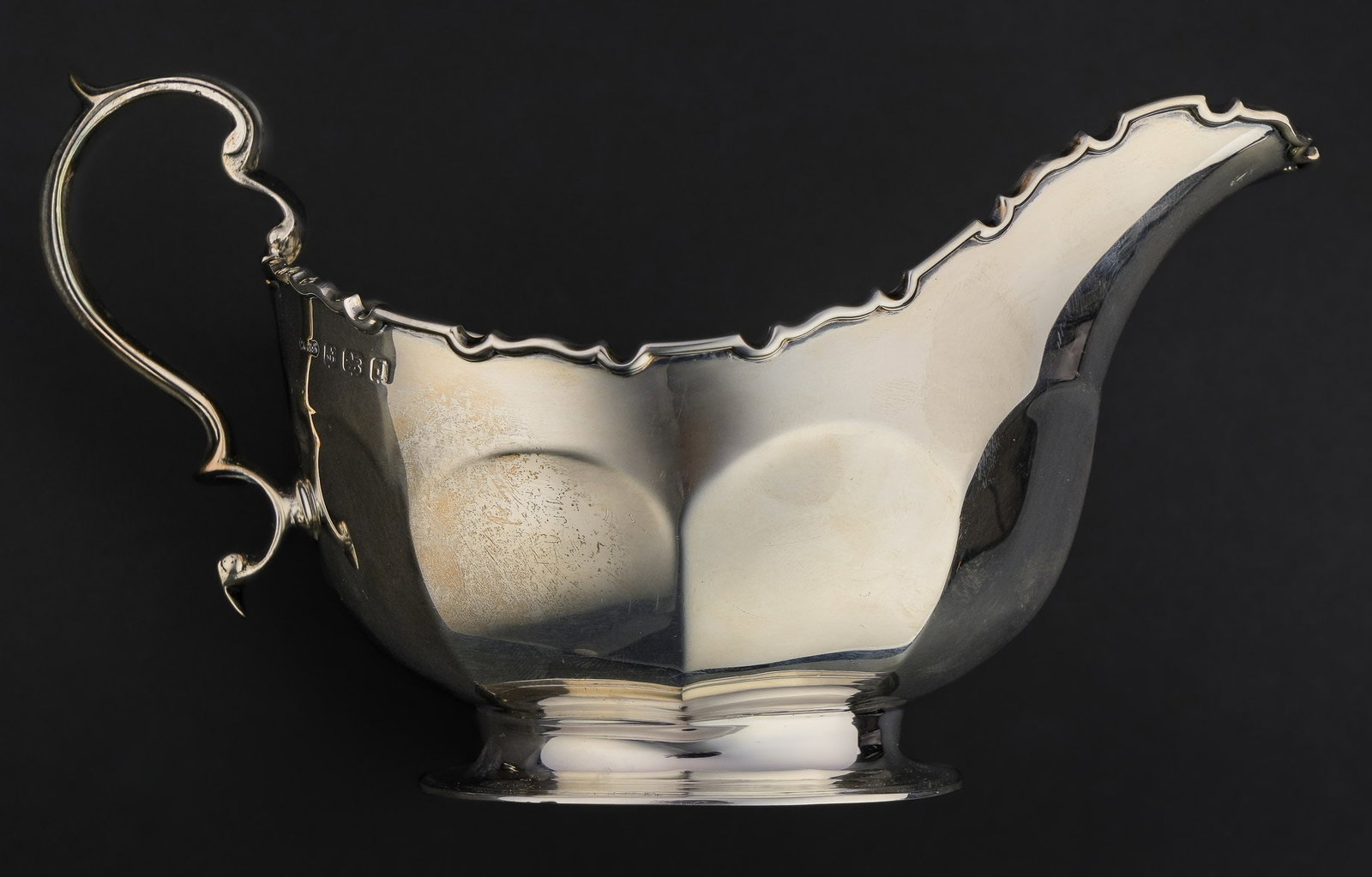Birmingham Sterling Silver Sauce Boat: William Greenfield and Sons Birmingham sterling silver sauce boat with paneled sides and scalloped rim, overall very good condition 4" x 7" x 4" 7.5 troy oz.