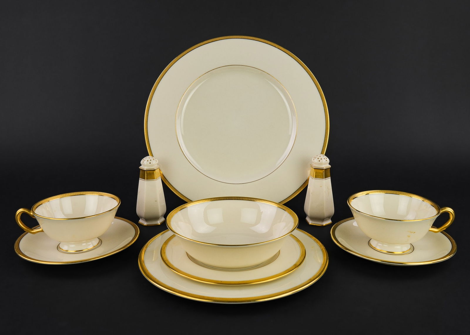 49 pcs. Lenox Gold Band Bone China Dinnerware: 49 pcs. Lenox gold band fine bone china dinnerware including dinner plates, cups and saucers, side plates, soup bowls and salt and pepper shaker set, overall excellent condition
