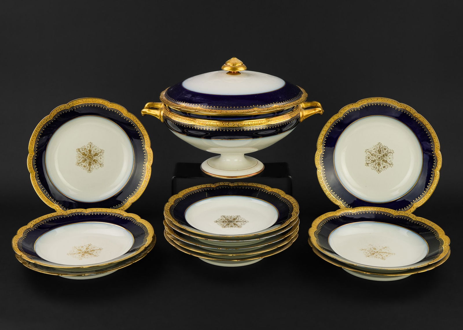 Wm. Guerin Limoges Cobalt Tureen and Soup Bowls: Late 19th c. Wm. Guerin Limoges cobalt blue and gilt engraved porcelain soup tureen and 11 matching soup plates 9"-13"