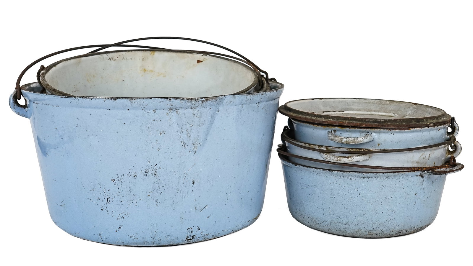 Six cast iron enamel kettles: Graduated set of six cast iron/enameled kettles unmarked as to maker but with size markings - 24 down to 5 with a #6 with a fitted condensation lid. largest is 17" diameter, smallest is 10" . Please n