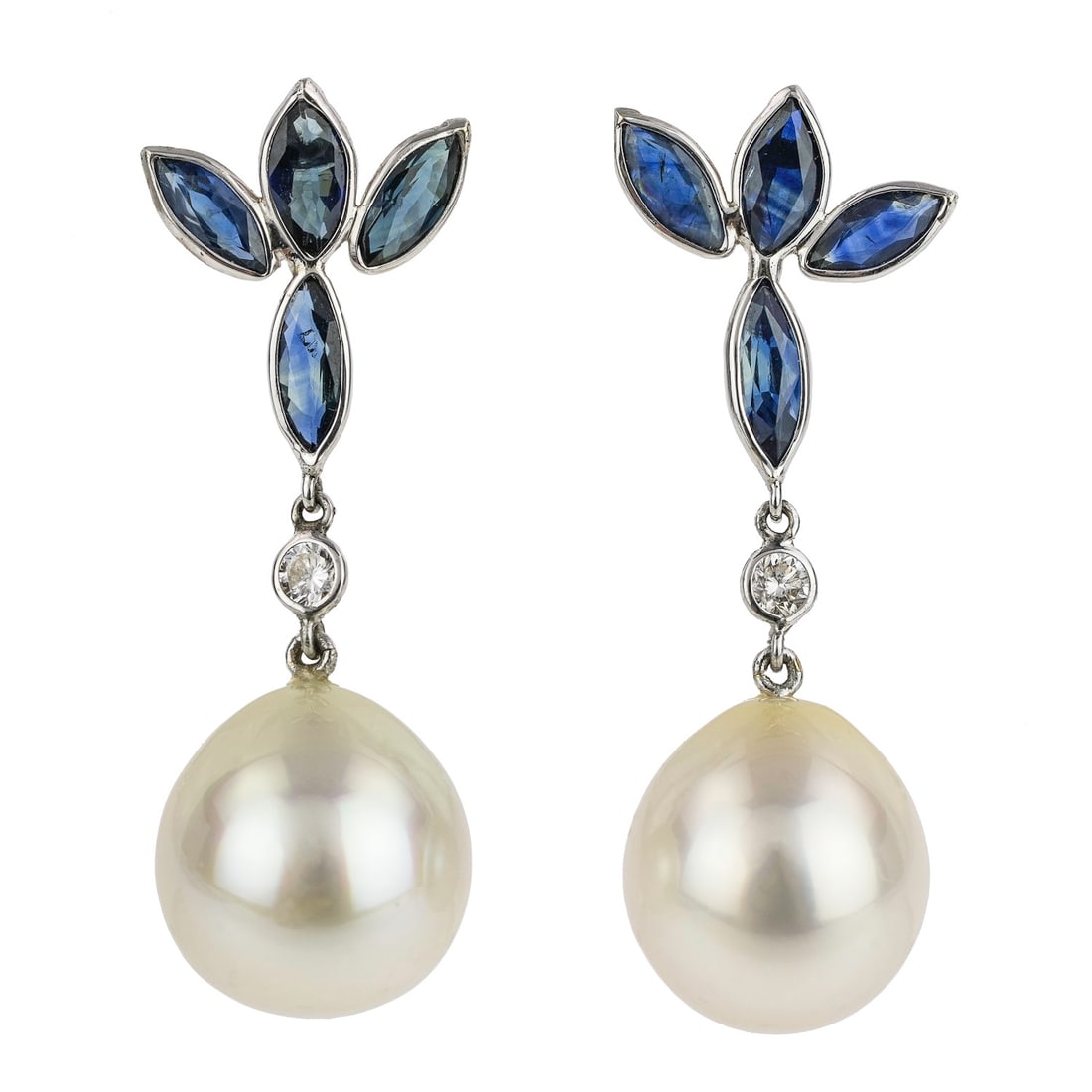 South Sea Pearl, Diamond, & Sapphire Earrings: Fine pair of 14k white gold earrings each with a 13 mm white south sea pearl, 4 marquise cut sapphires and one rd cut .08 ct diamond. Approx. 2.5 cts t.w. sapphires. 1 3/8" long.