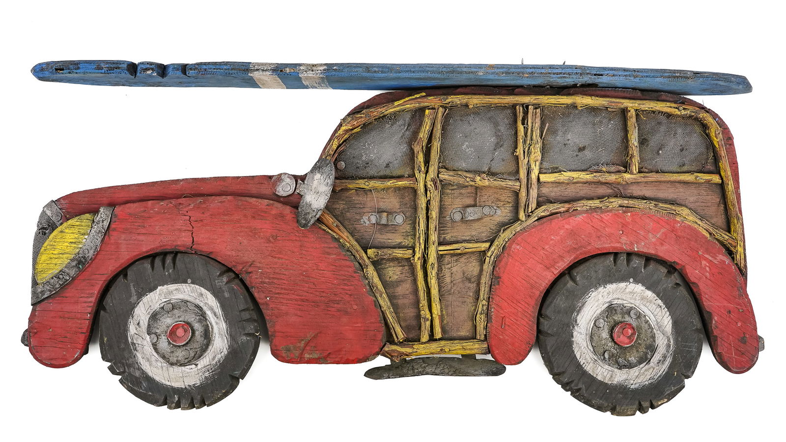 Joe Mason, Killington, VT Outsider Art Wall Sculpture: Joe Mason, Killington, Vt outsider/ folk art wall sculpture of a woody wagon with a surfboard (fin likely missing), signed on reverse, length 34 1/2"