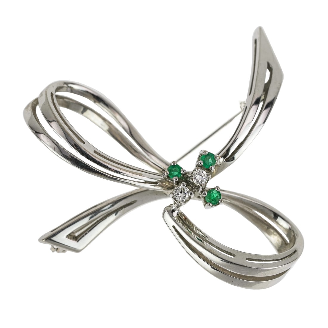 14k Emerald & Diamond Brooch: 14k white gold bow tie form brooch with 2 .02 ct round cut emeralds and 2 .02 ct round cut diamonds. 8.2 grams t.w. 1 7/8" long.