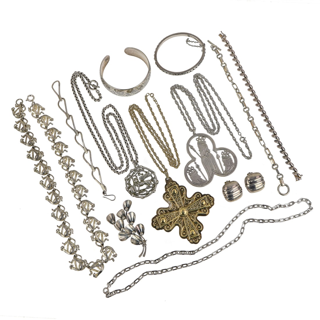 Vintage Sterling Jewelry: A group of vintage sterling jewelry including a S Kirk & Son floral engraved bangle. Nefrom Denmark floral brooch. Several sterling chains and bracelets. 1972 Reed & Barton Christmas cross necklace.