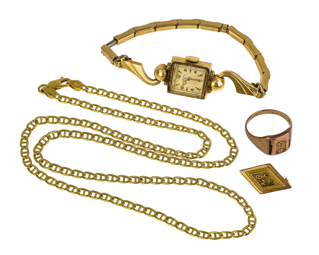 Yellow Gold Jewelry: A group of yellow gold jewelry including a 14k yellow gold chain necklace. A 10k yellow gold class ring. A 10k yellow gold pin. A 14k yellow ladies Elgin wrist watch with gilt elastic band.