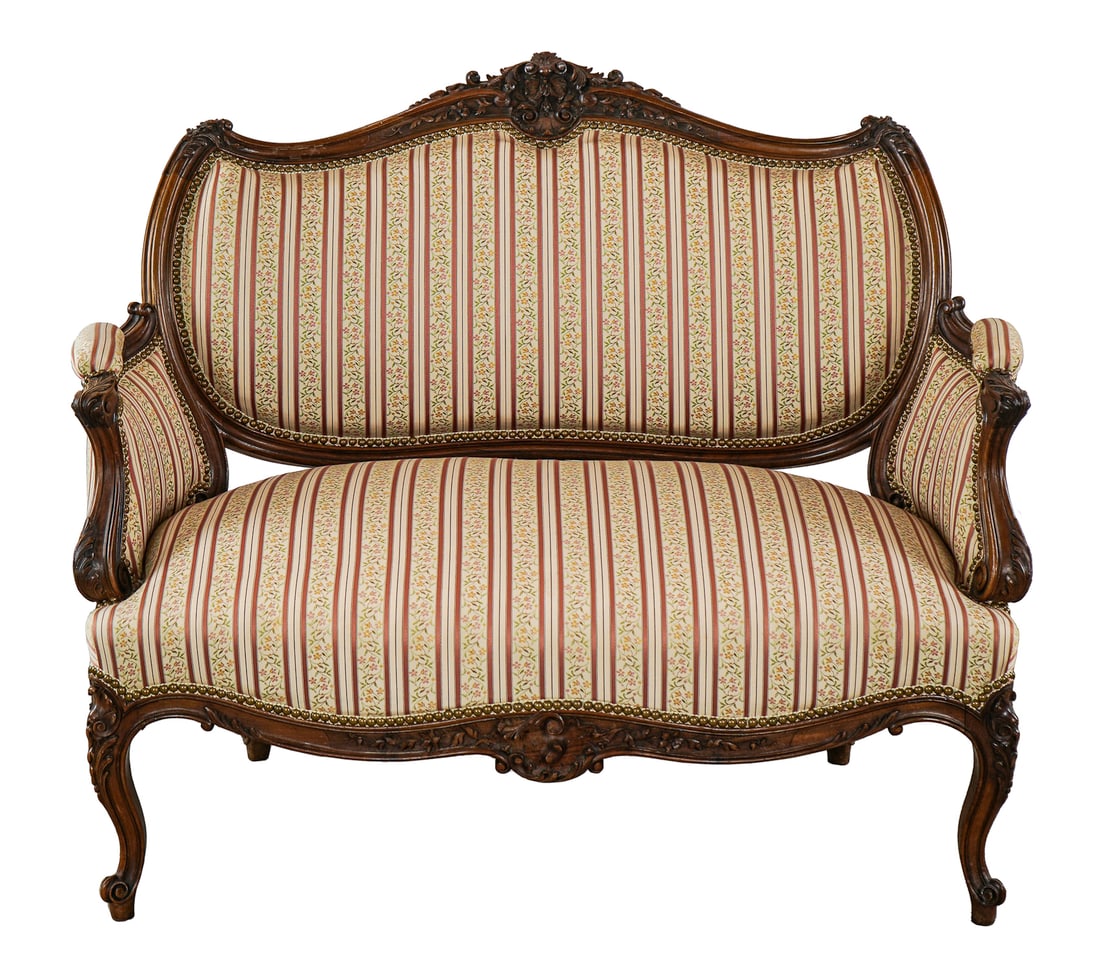 Louis XVI Style Walnut Settee: late 19th c Louis XVI style walnut settee in a newer floral covering. Very good condition. Nicely recovered. 48" wide, 38" high. Sold to benefit The Lake Champlain Land Trust. Local Pick up only.