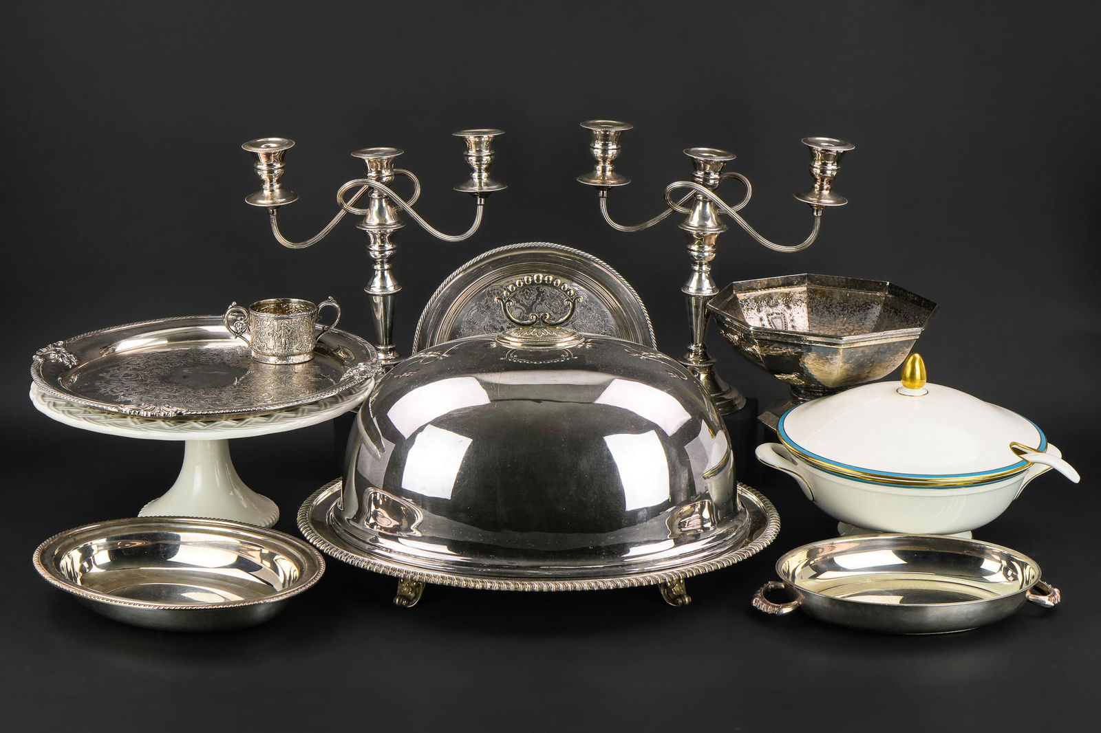 Silverplated Tableware, Porcelain incl. Tiffany: Lot of formal tableware including silverplated warming dome, pair of old Sheffield silverplated candelabra, Minton "Saturn" pattern porcelain tureen, Tiffany and Co. Italian ceramic cake stand, 2 silv