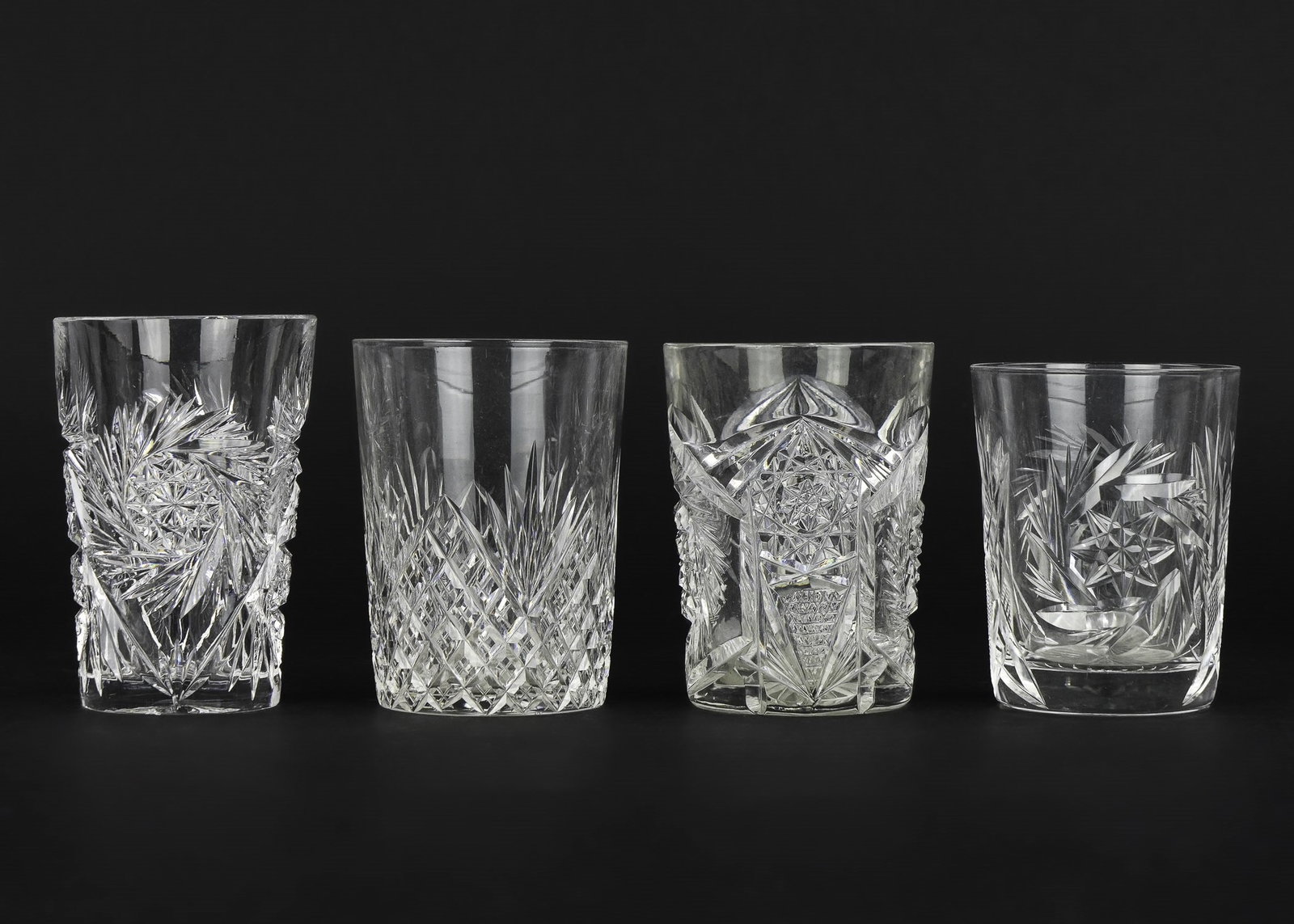 Collection of 55 Brilliant Cut Glass Tumblers: Collection of 55 brilliant cut glass tumblers or old fashioned glasses in various cuttings, some in matched sets, other singles ht. 4"