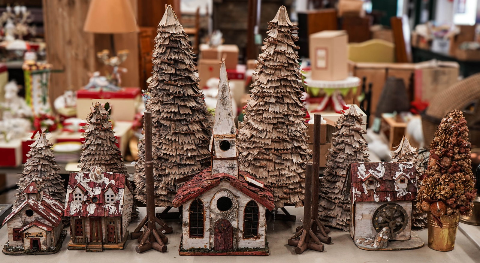 Birch Bark Christmas Village: Adirondack style birch bark Christmas village having 6 trees, mill house, school house, house, and meeting house. 9" h to 33"h. 4 poles for lights.